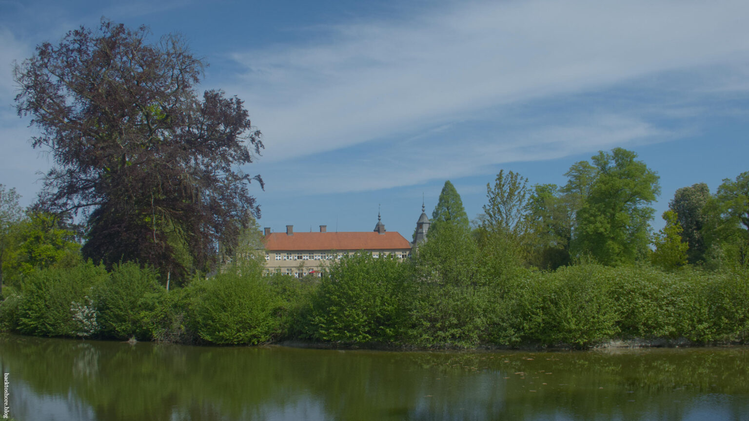 Manor House behind a lake