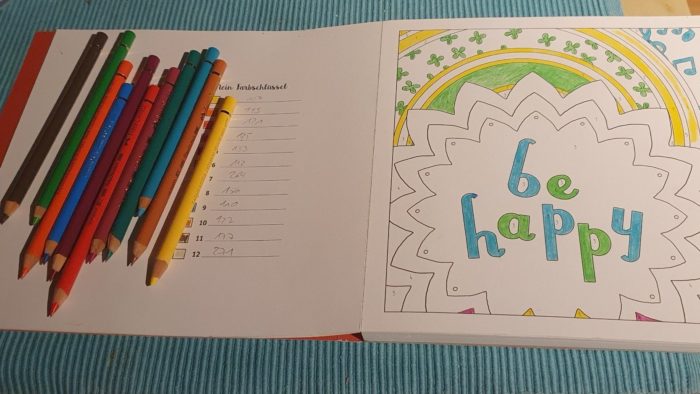 Colouring Book with a "Bee Happy" drawing and 12 colour pencils 
