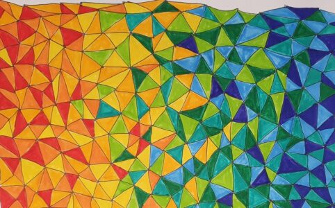 Picture of a page filled with small triangles, coloured in a variety of colours from red, orange, yellow, shades of green and blue