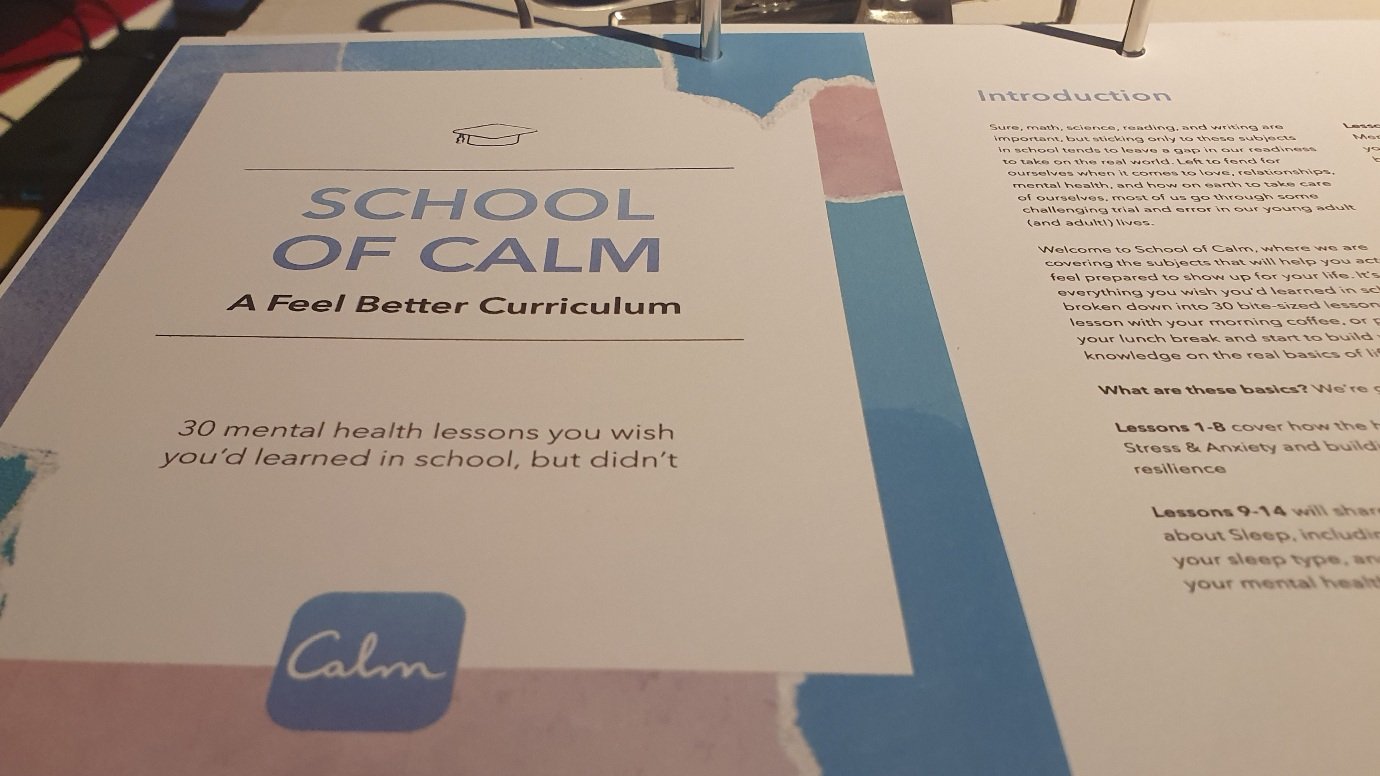 Photo of printed out "School of Calm" in a folder