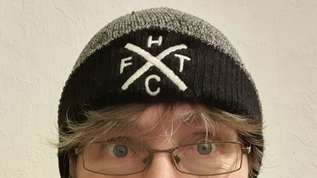 Photo of the upper half of my head (glasses upwards), wearing the FTHC cap