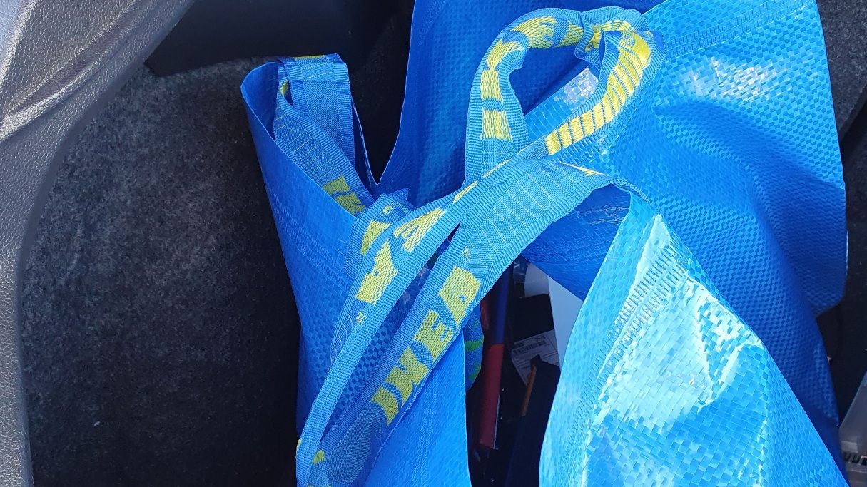 Photo of a blue IKEA bag in a car's boot