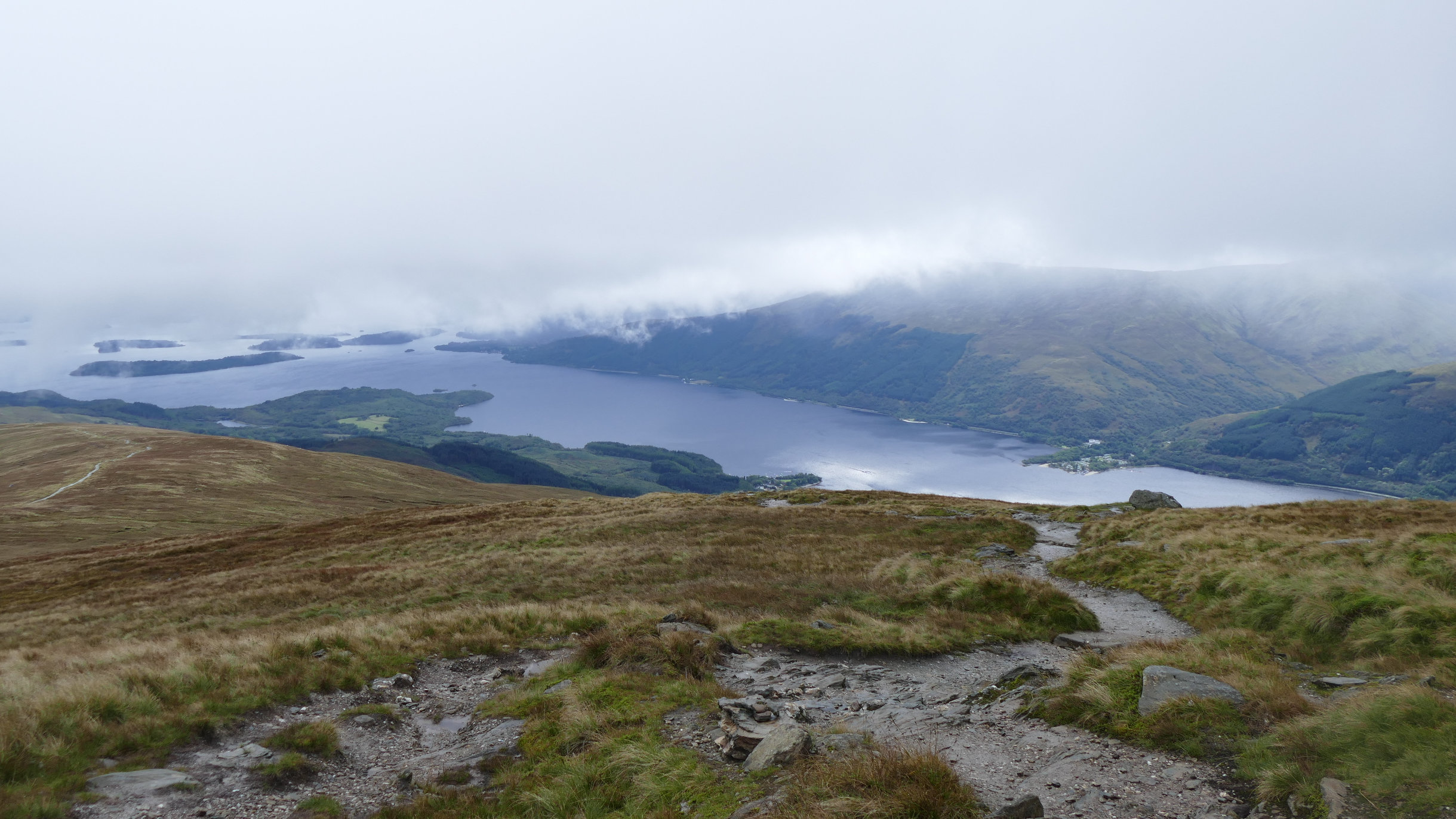 View from Ben Lomond down to the loch, Fog above the water